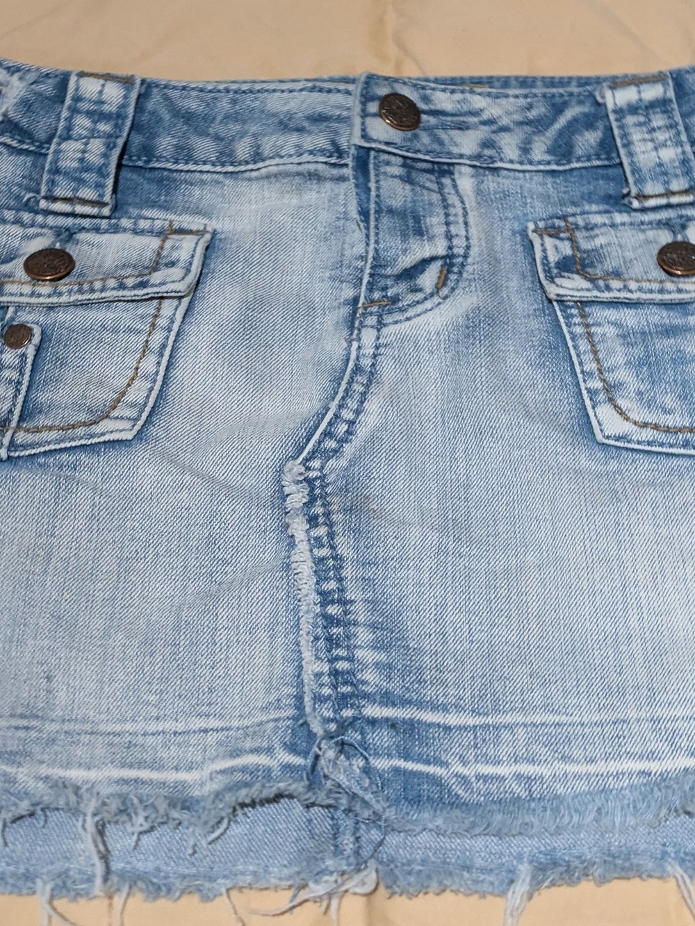 Light Blue Denim Mini Skirt with Frayed Hem